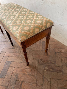 An Edwardian rosewood and inlaid duet stool