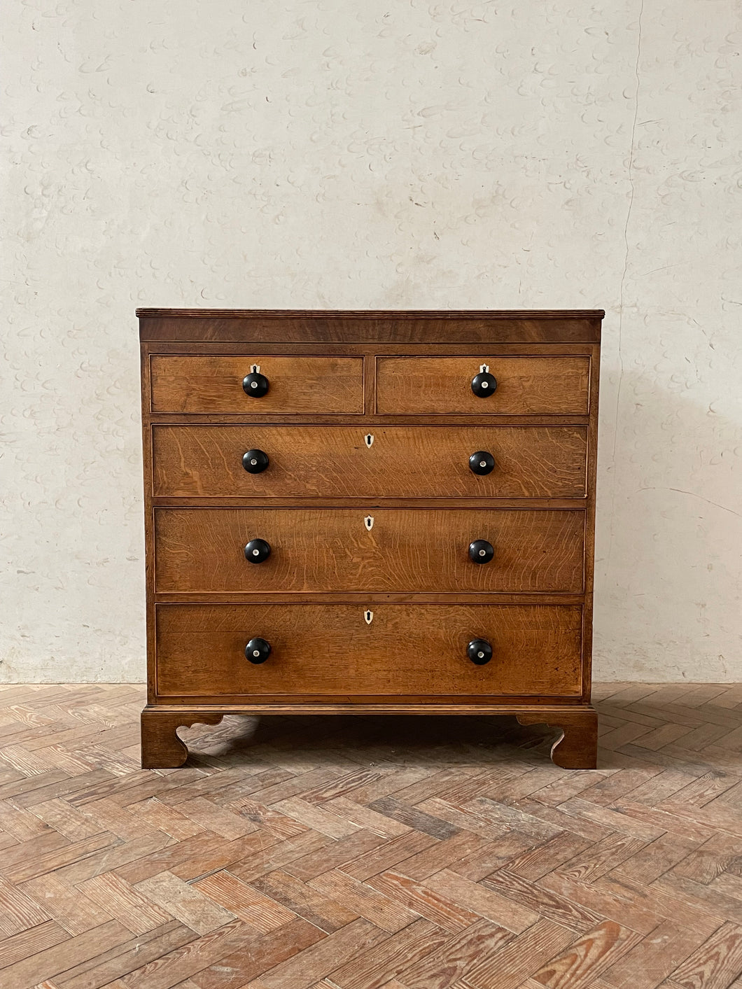 Georgian Oak Chest of Drawers - with mother of pearl inlay on handles.
